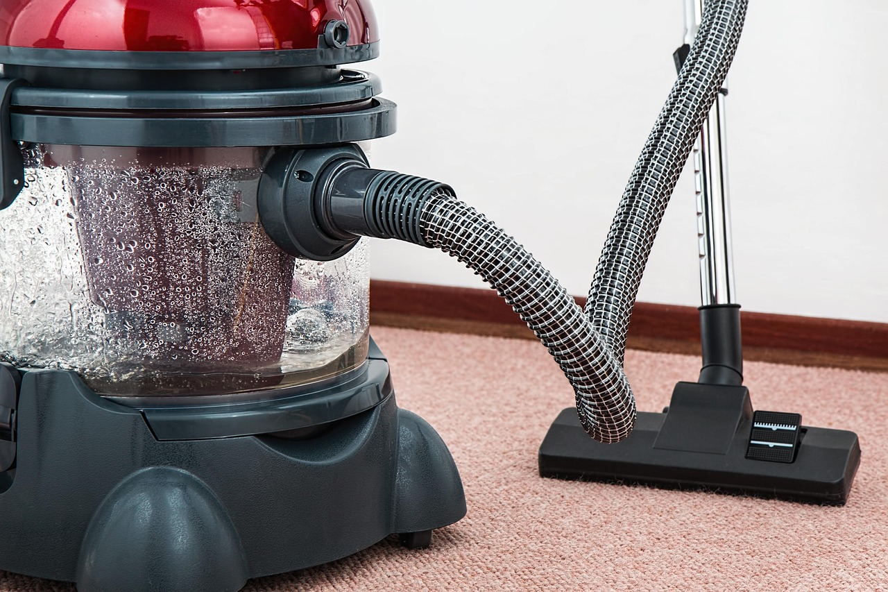 Vacuum cleaner on a carpeted floor