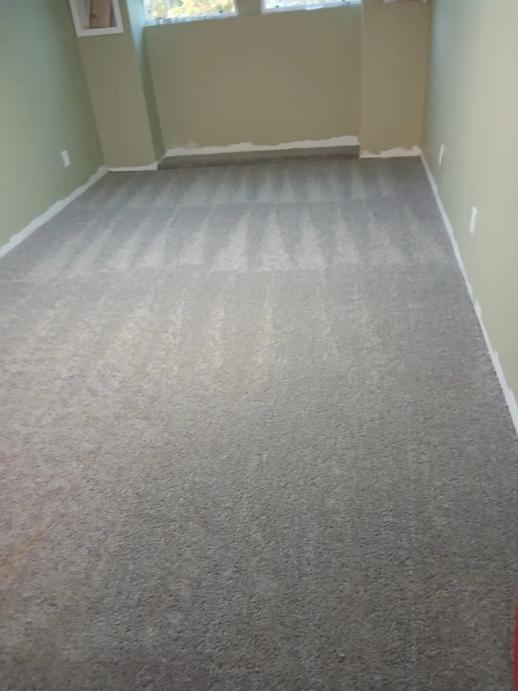 Cleaned carpet in an empty room