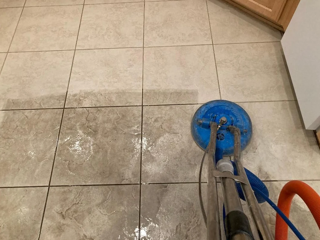 Tile and grout cleaning with a rotary tool